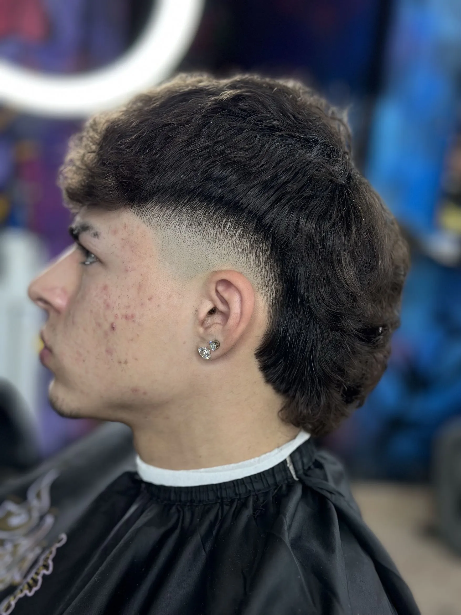 Corte mullet con degradado en los laterales